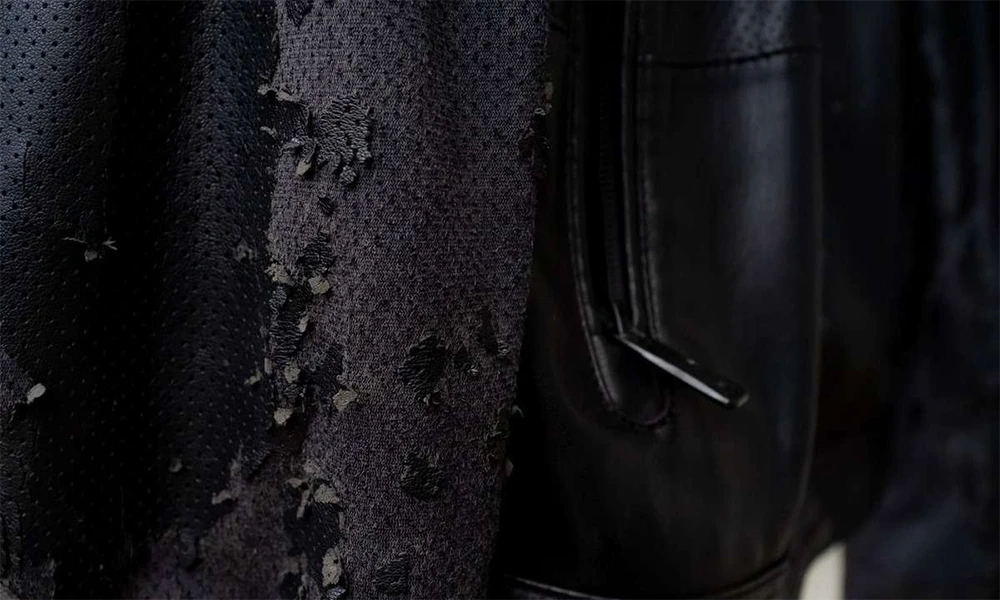 peeling black leather jacket