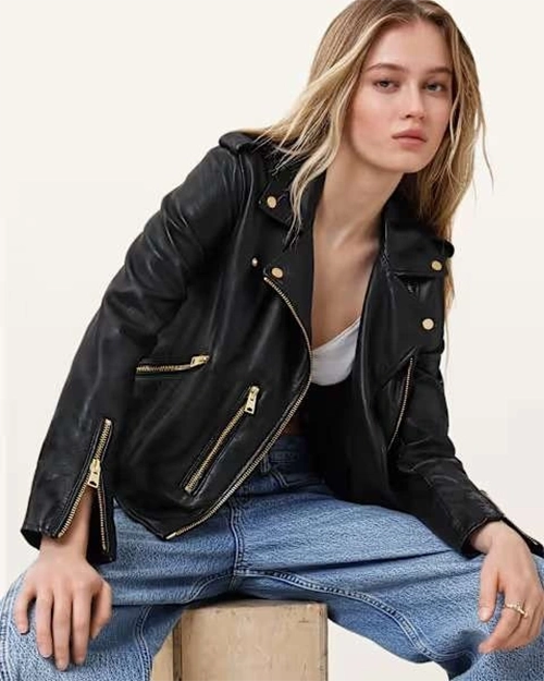 woman in black leather jacket and jeans