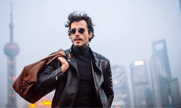 man in black leather jacket and sunglasses